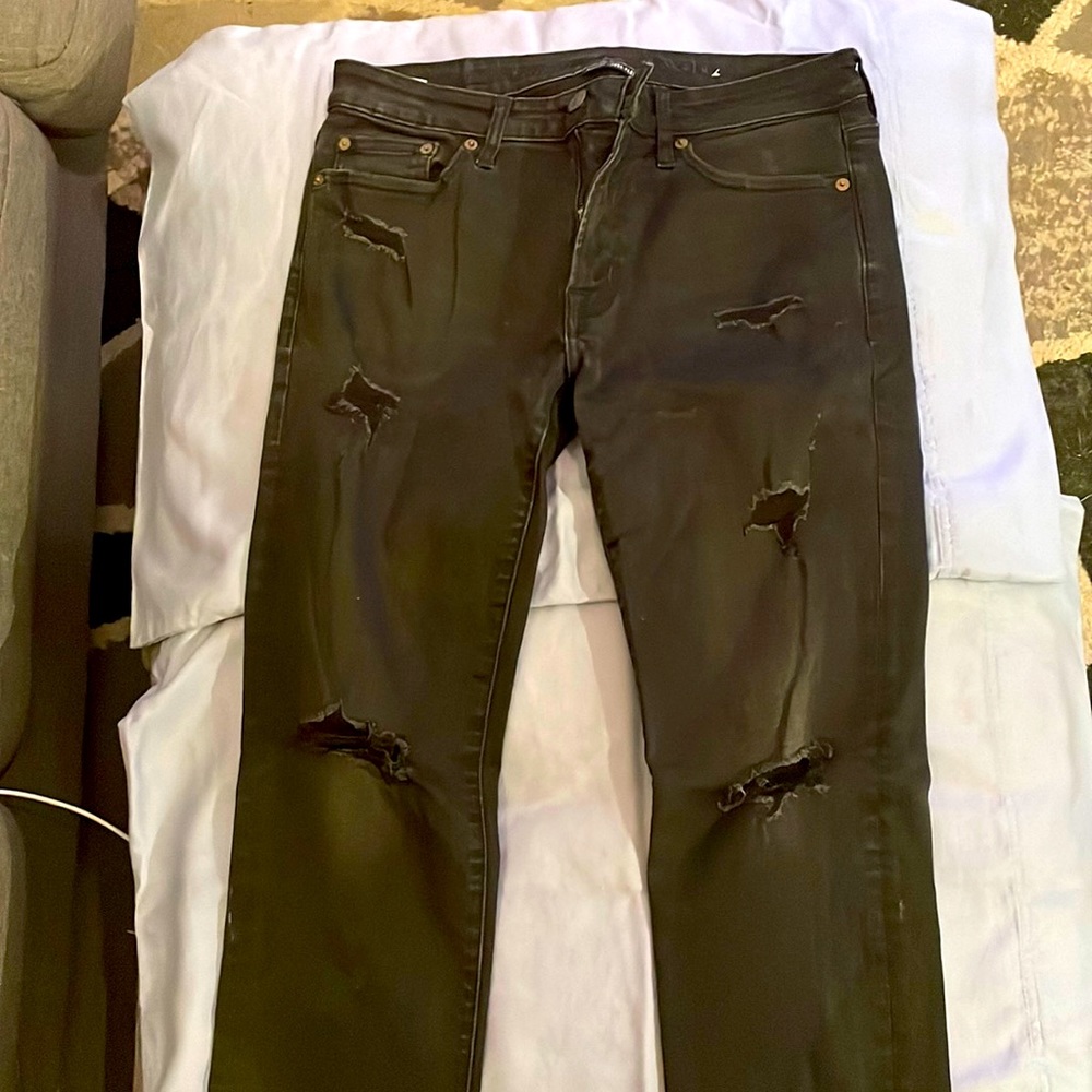 Black flex distressed jeans